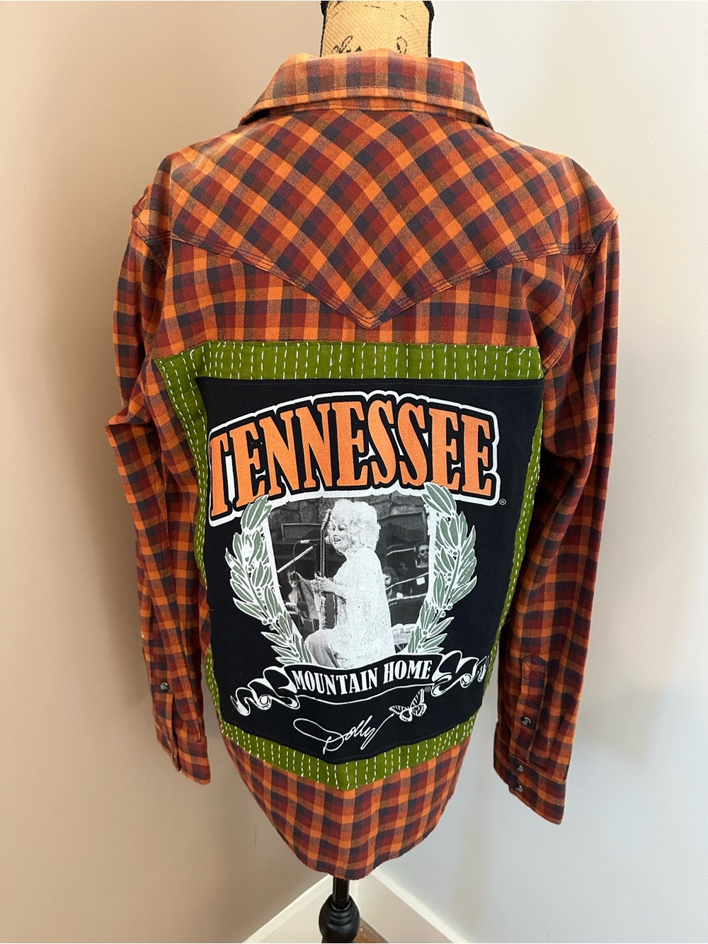 one-of-a-kind, handmade up-cycled flannel featuring DOLLY PARTON Sz S-L 22.5”ptp